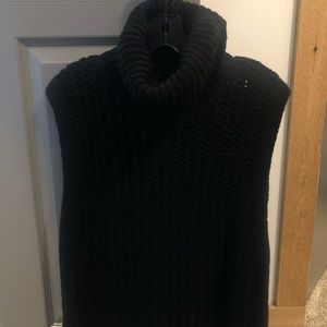 Black pull over sleeveless turtleneck